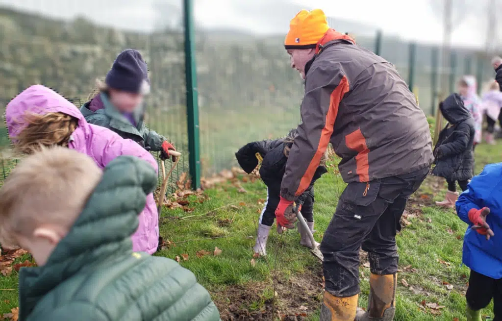 Children digging at silsden primary school