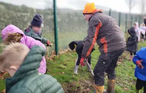 Children digging at silsden primary school