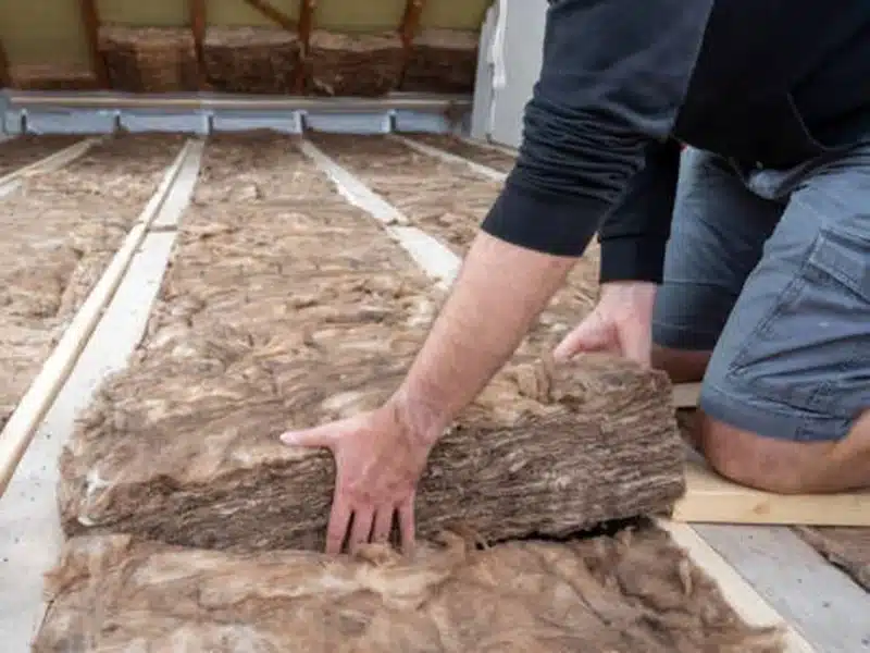 loft insulation being installed